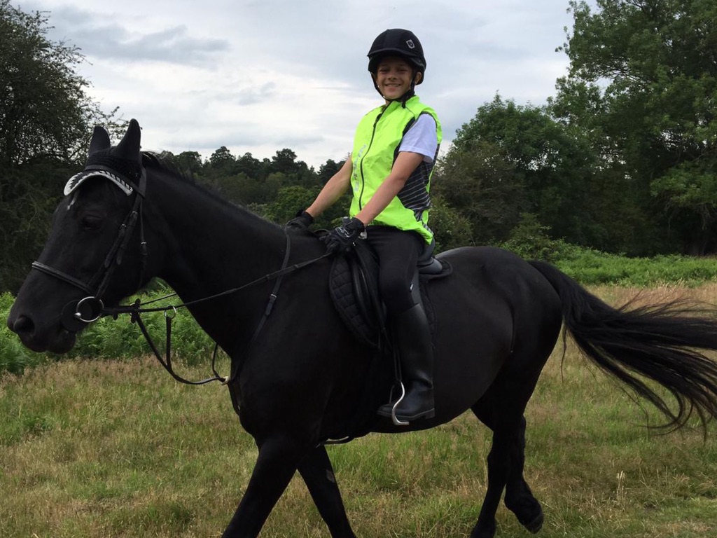 Daniel as a child with a horse